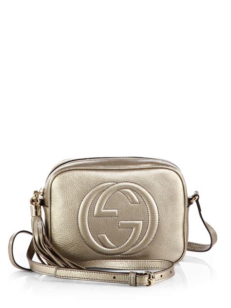 gucci bag with foil logo.